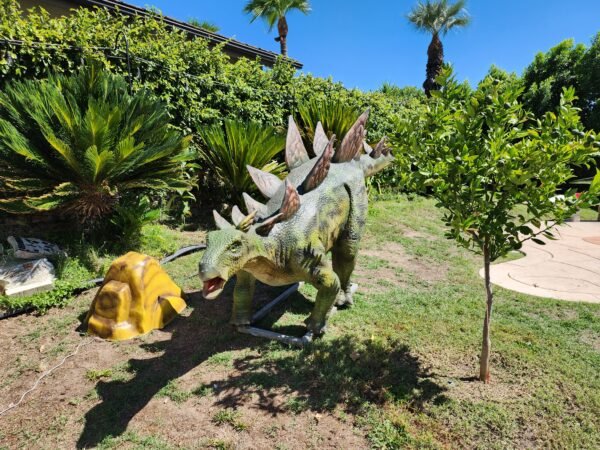 Stegosaurus Animatronic Prop With Assorted Palm Trees