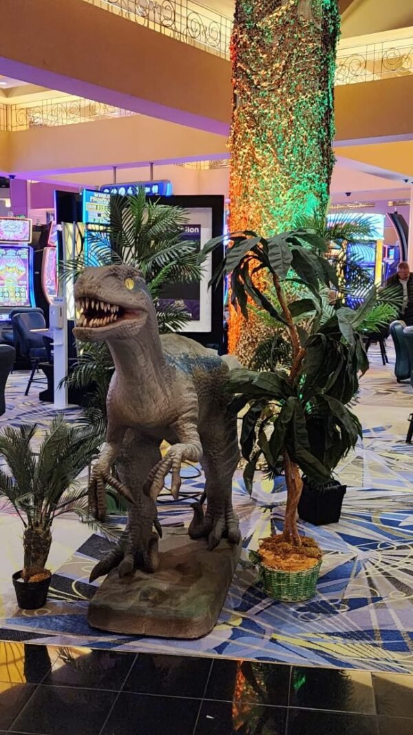 Blue Velociraptor Animatronic Prop With Assorted Palm Trees